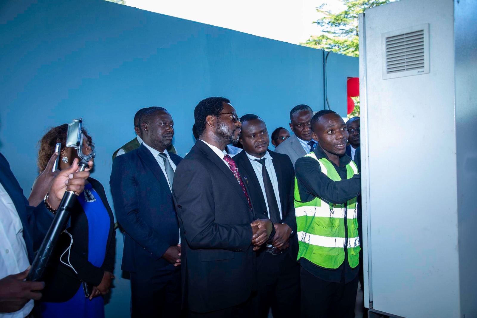 An Engineer showcasing how the incinerator works